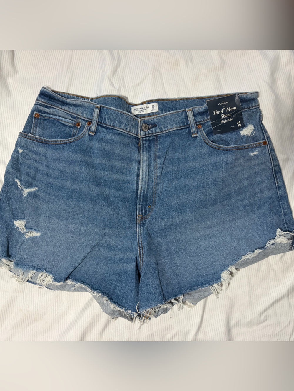 High-Rise Distressed Denim Shorts - Blue